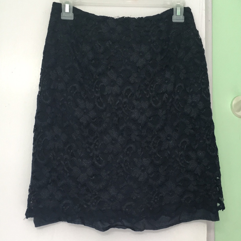 Dark blue floral lace patterned skirt.